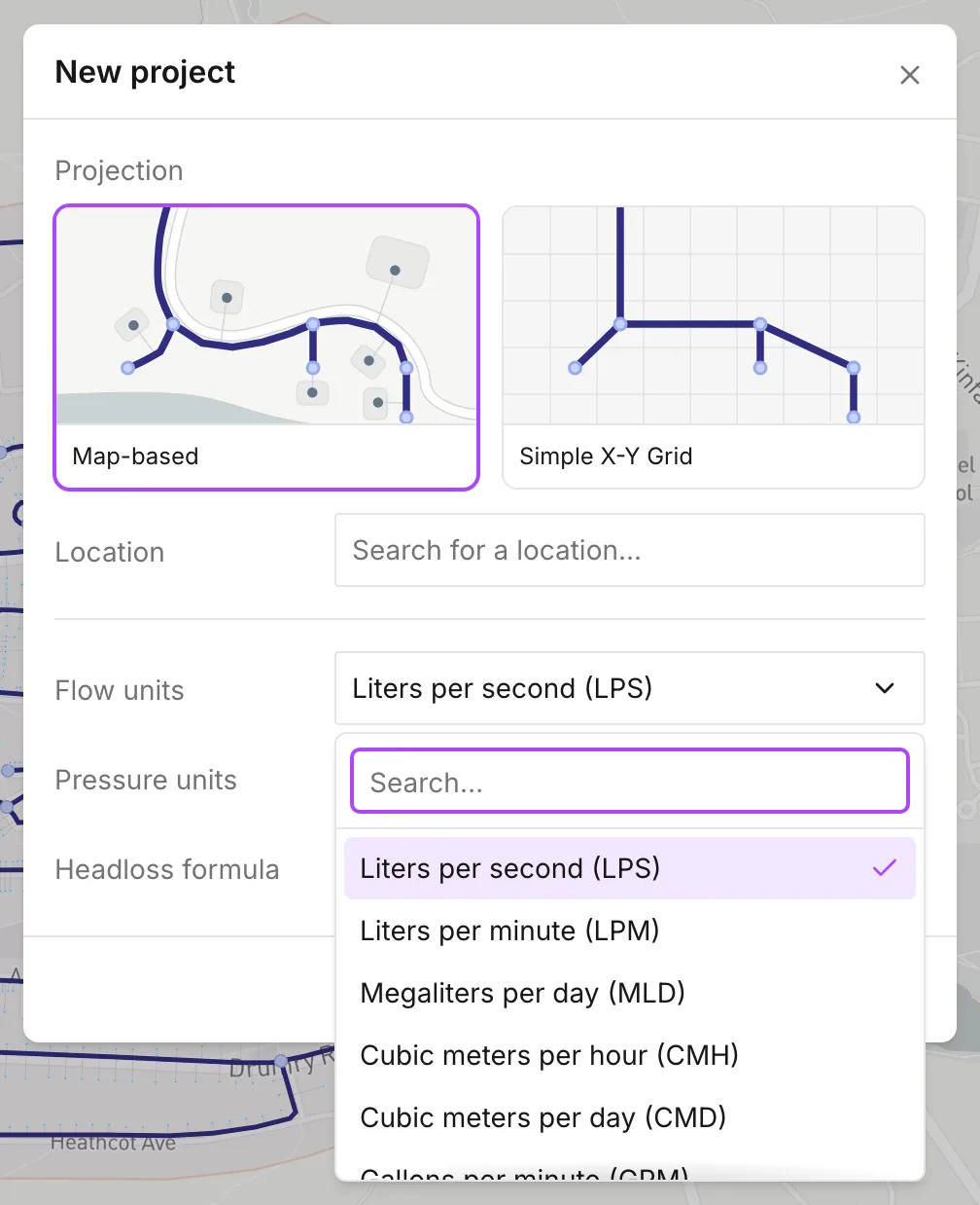 The New project dialog with the Flow units list open, over the Pressure units and Headloss formula rows